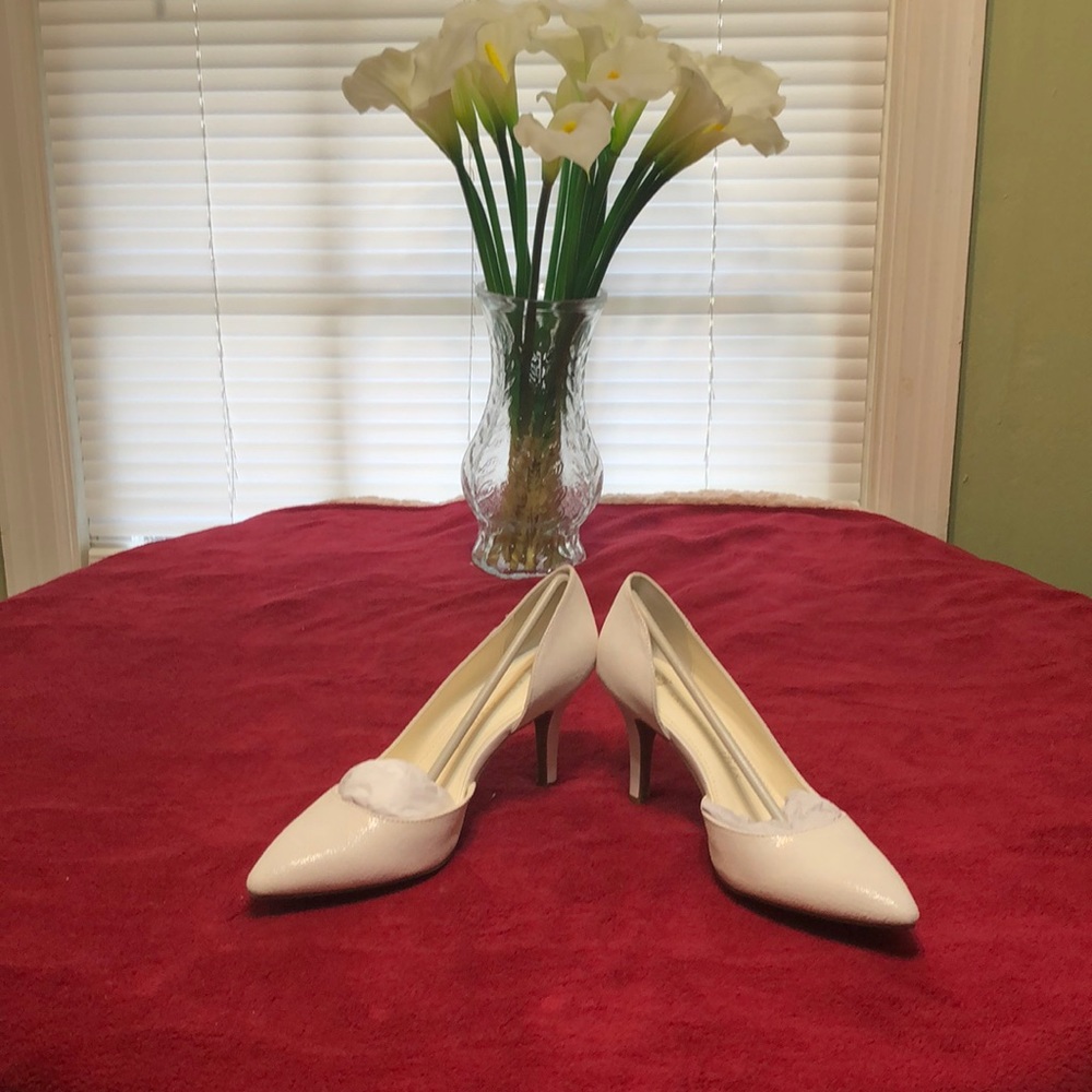 White pumps.
